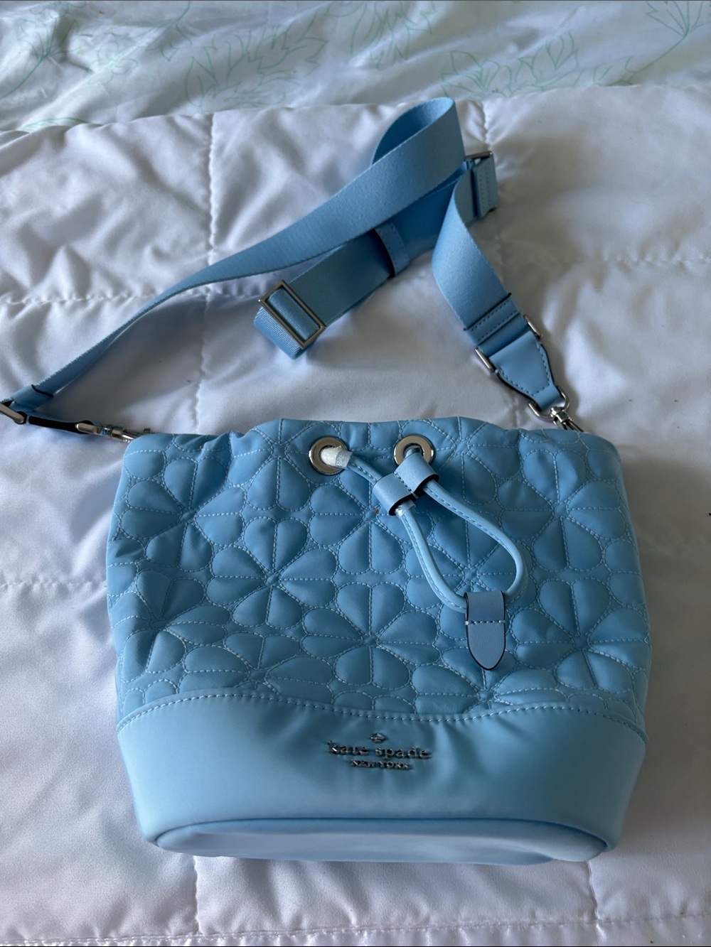 kate spade Sky Blue Quilted Floral Drawstring Crossbody Bag
